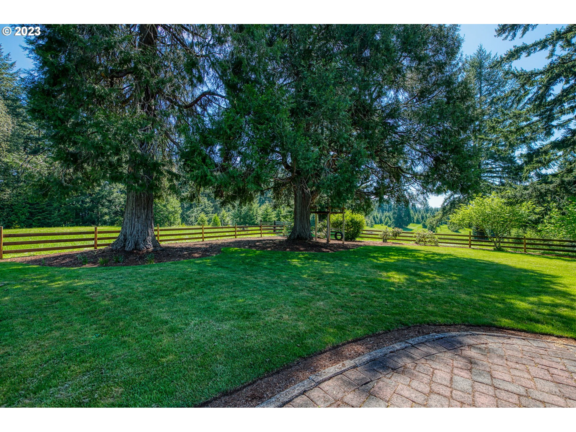 77914 Chisholm Trail Road Cottage Grove, OR 97424 - Photo 38 of 41 a view of a park with large trees