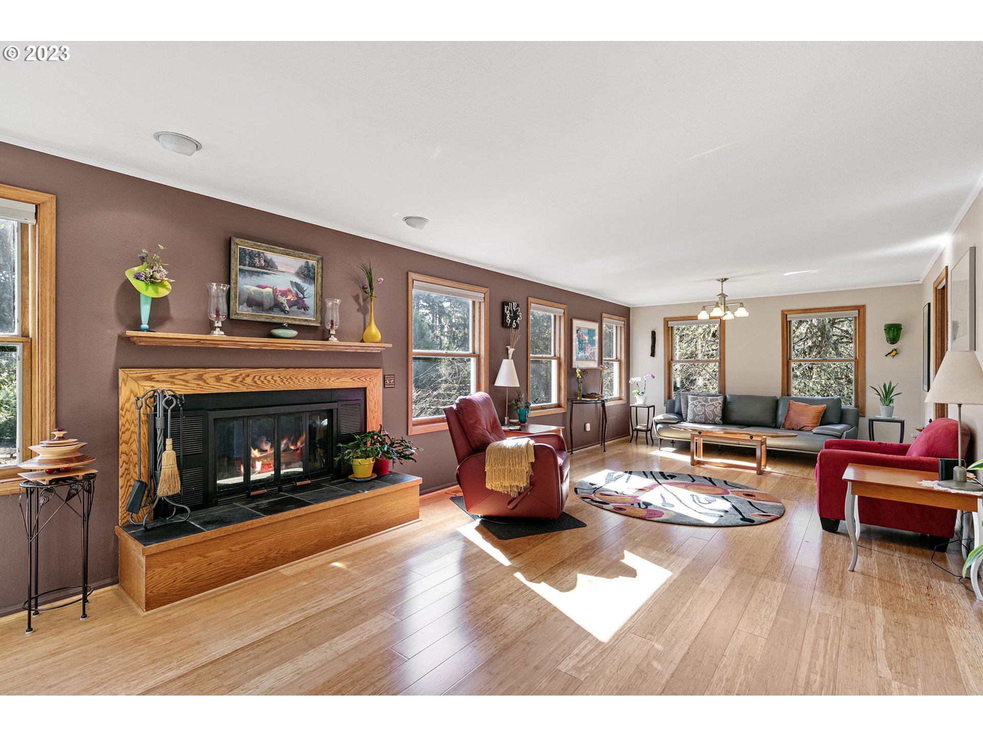 77914 Chisholm Trail Road Cottage Grove, OR 97424 - Photo 9 of 41 a living room with furniture and a fireplace