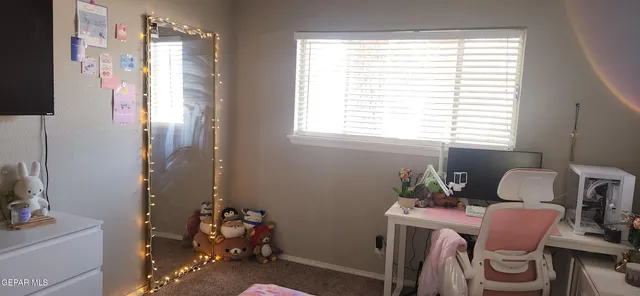 a room with furniture and a window