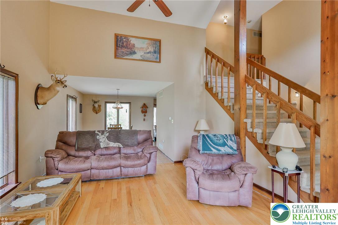 1208 Rone Drive Wind Gap, PA 18091 - Photo 15 of 78 a living room with furniture and a wooden floor