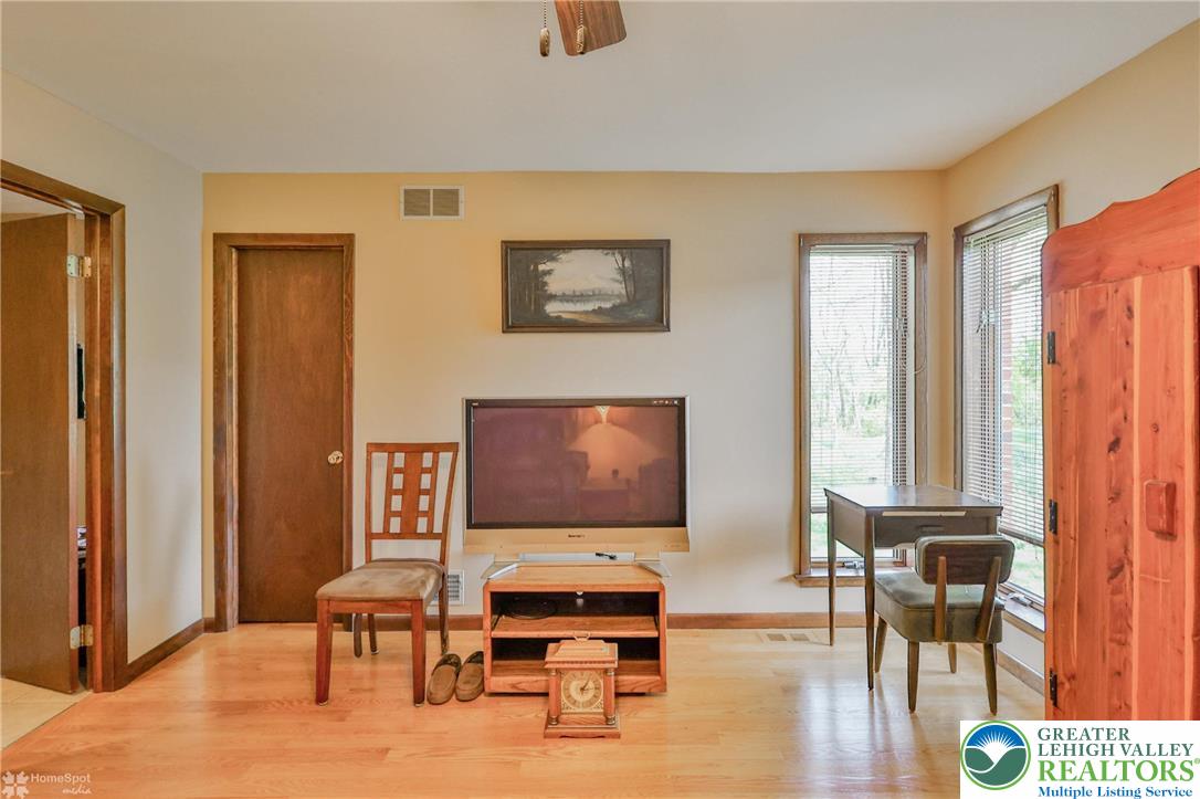 1208 Rone Drive Wind Gap, PA 18091 - Photo 36 of 78 a living room with furniture and a flat screen tv