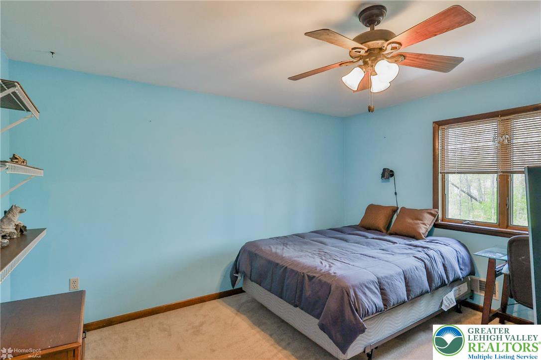 1208 Rone Drive Wind Gap, PA 18091 - Photo 41 of 78 a bedroom with a bed and a window