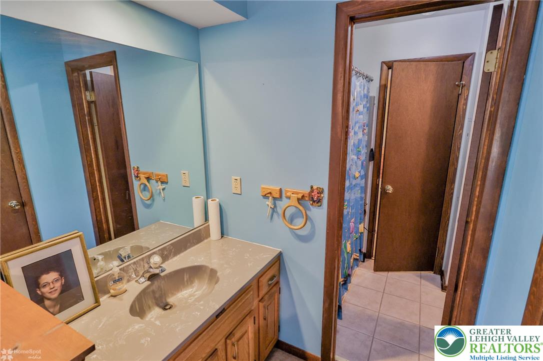 1208 Rone Drive Wind Gap, PA 18091 - Photo 46 of 78 a bathroom with a bathtub and shower