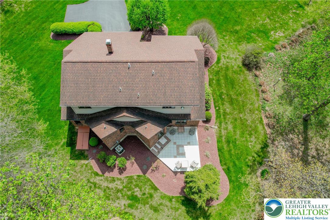 1208 Rone Drive Wind Gap, PA 18091 - Photo 71 of 78 an aerial view of a house with a yard and large trees