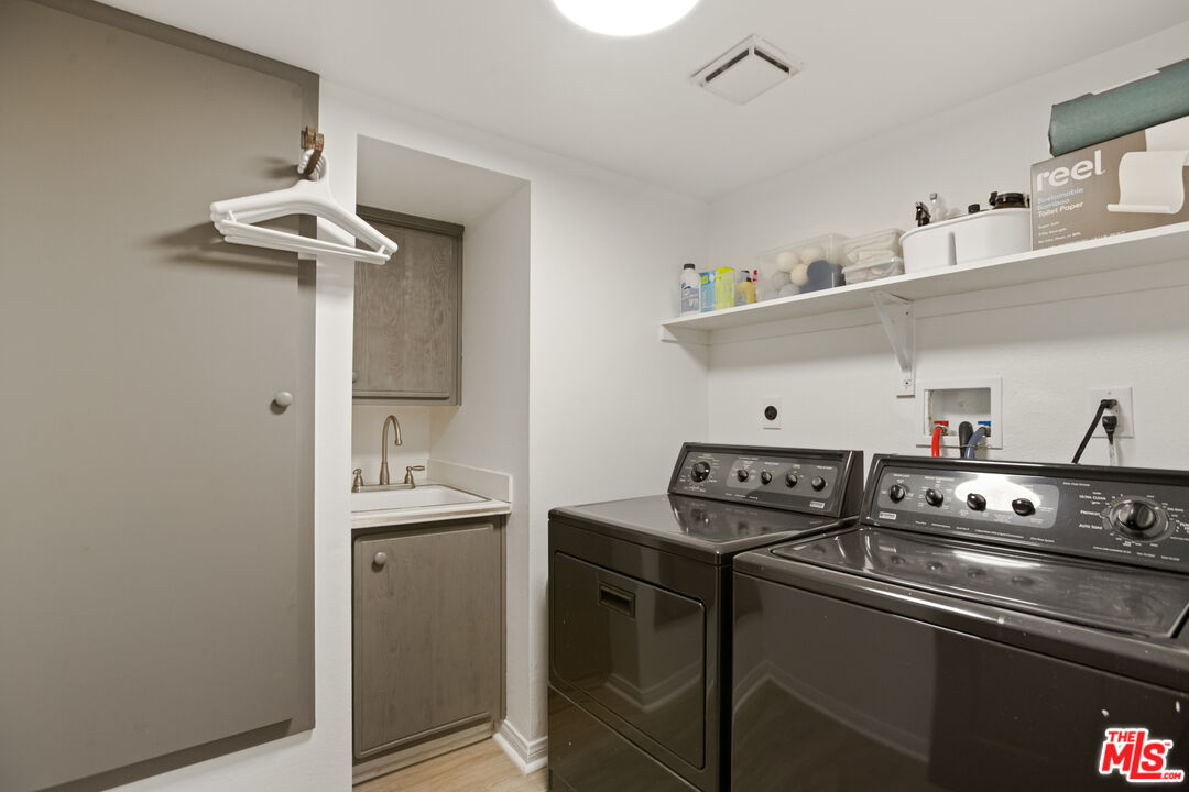 2845 Harbor Boulevard Oxnard, CA 93035 - Photo 29 of 47 a kitchen with stainless steel appliances a stove a sink and cabinets