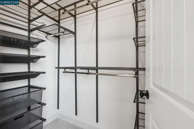 a view of a room with racks on the wall