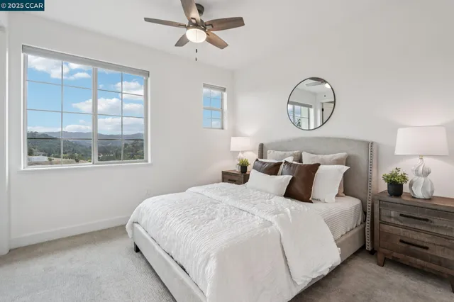 a bedroom with bed and a window