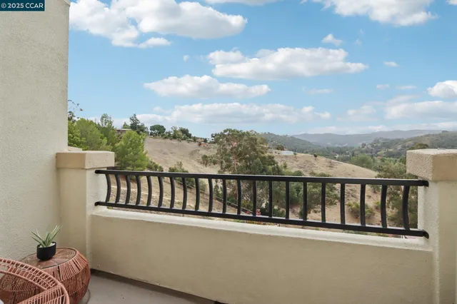 a balcony with furniture