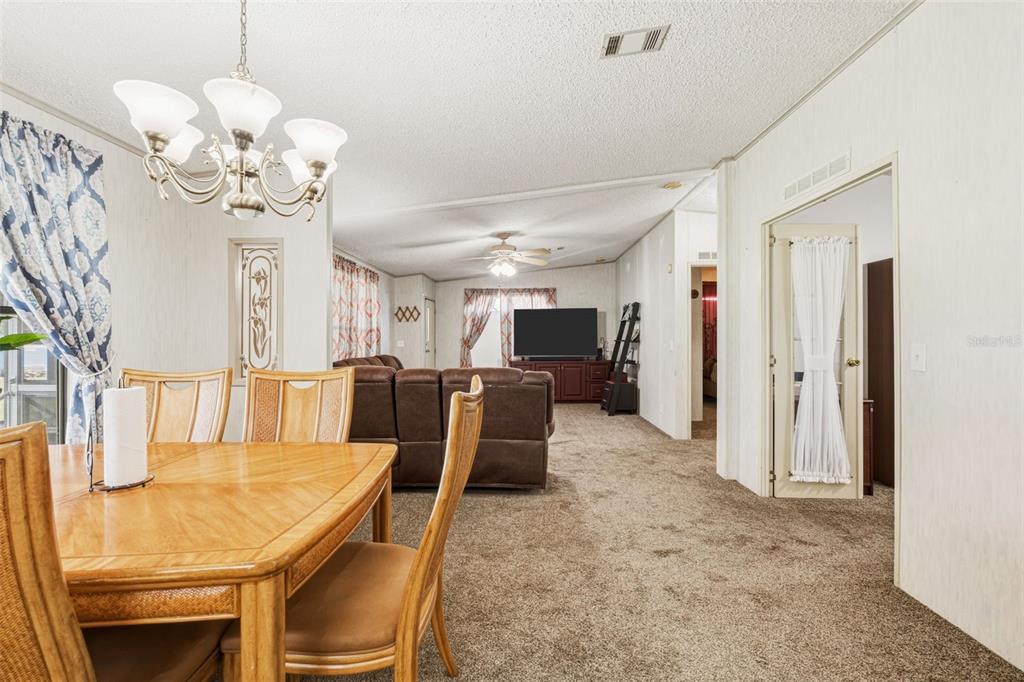 1586 Grapefruit Street Arcadia, FL 34266 - Photo 15 of 40 a view of a dining room with furniture