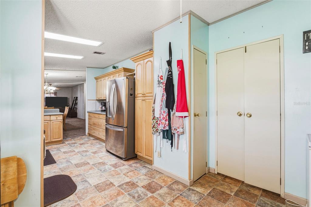 1586 Grapefruit Street Arcadia, FL 34266 - Photo 21 of 40 a view of a kitchen with a refrigerator and a sink