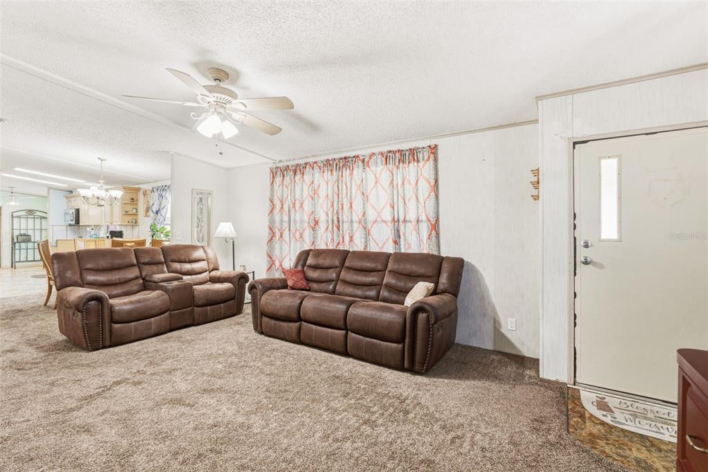 1586 Grapefruit Street Arcadia, FL 34266 - Photo 34 of 40 a living room with furniture and a window