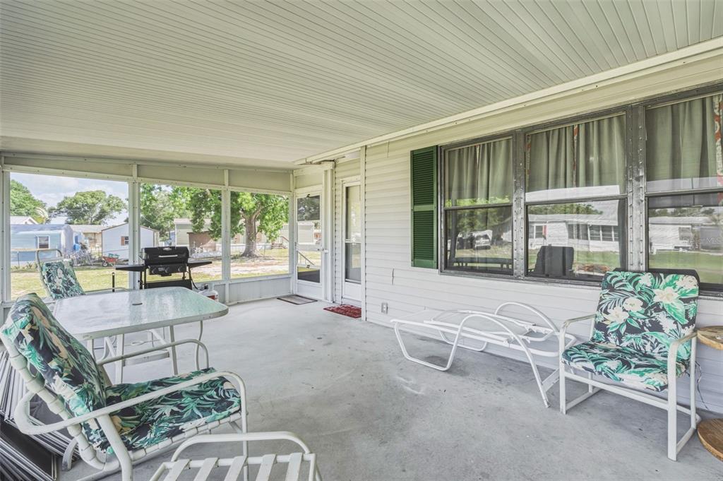 1586 Grapefruit Street Arcadia, FL 34266 - Photo 9 of 40 a living room with furniture a window and outer view