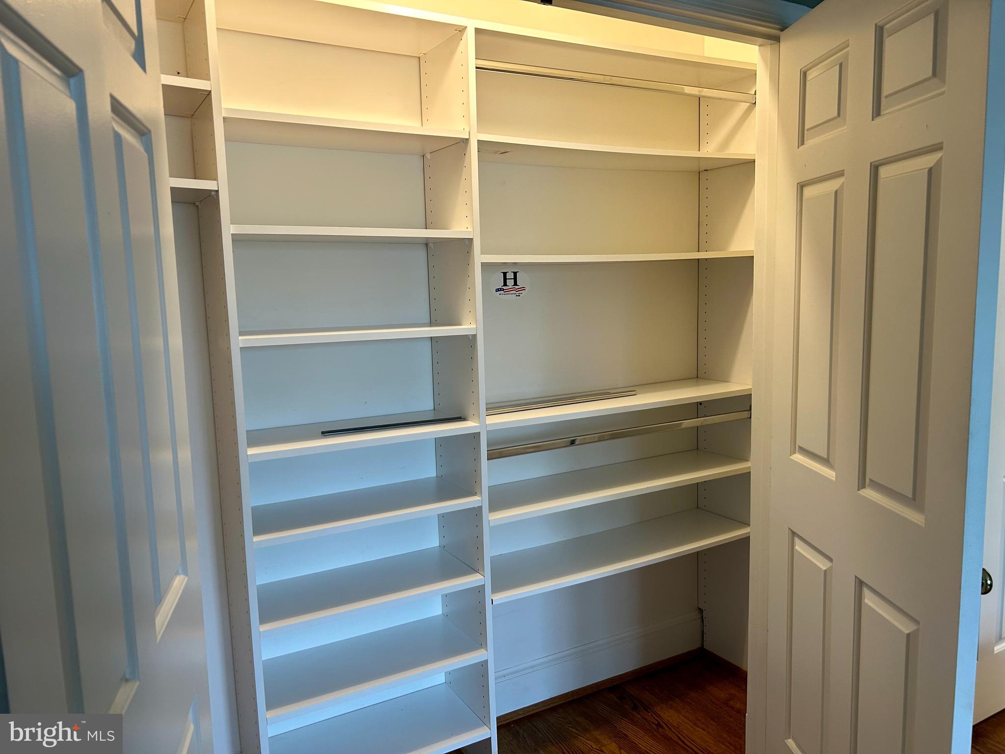 4416 Lingan Road Northwest Washington, DC 20007 - Photo 21 of 59 a view of walk in closet with empty racks
