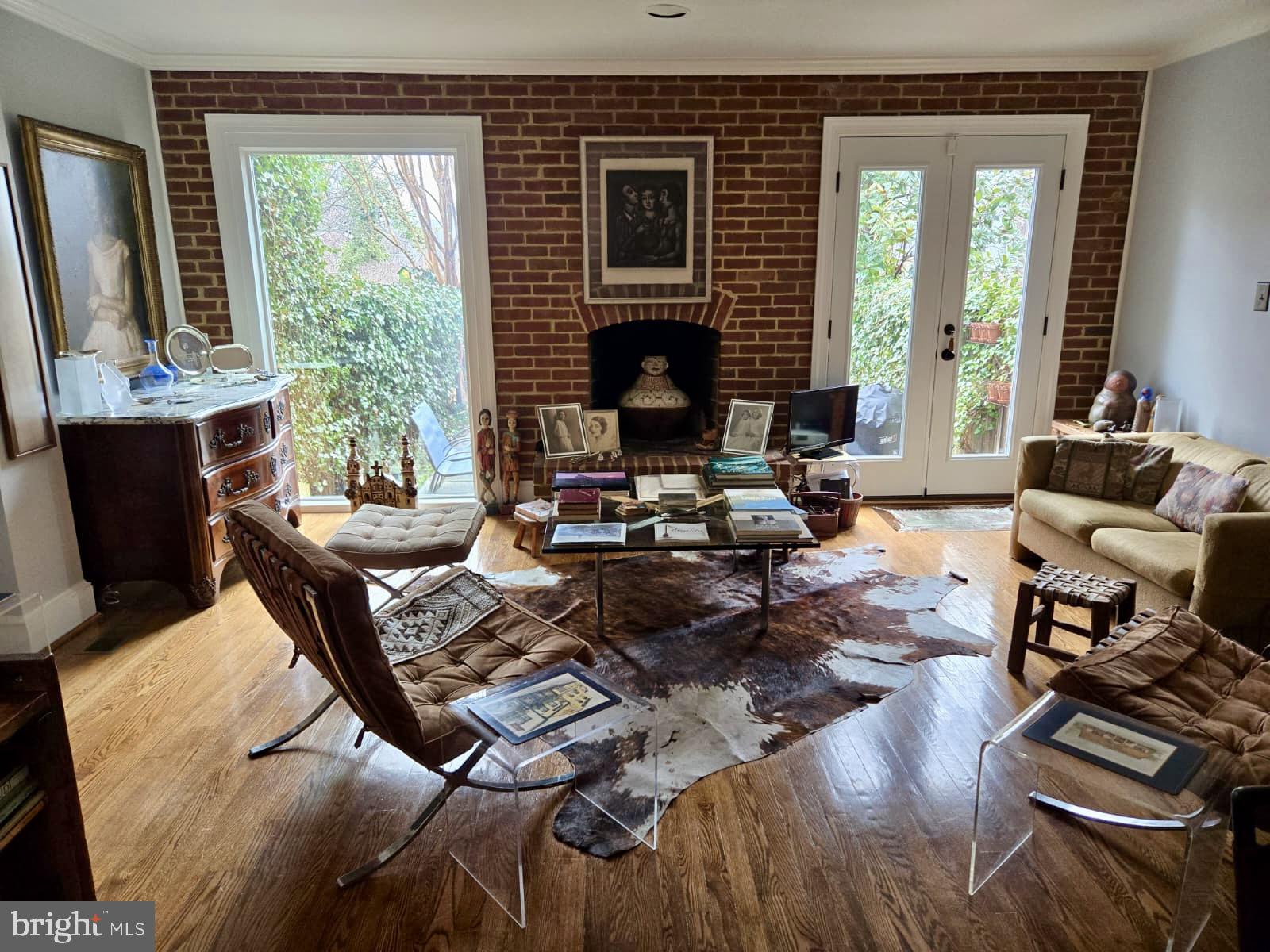 4416 Lingan Road Northwest Washington, DC 20007 - Photo 3 of 59 a living room with furniture fireplace and a large window
