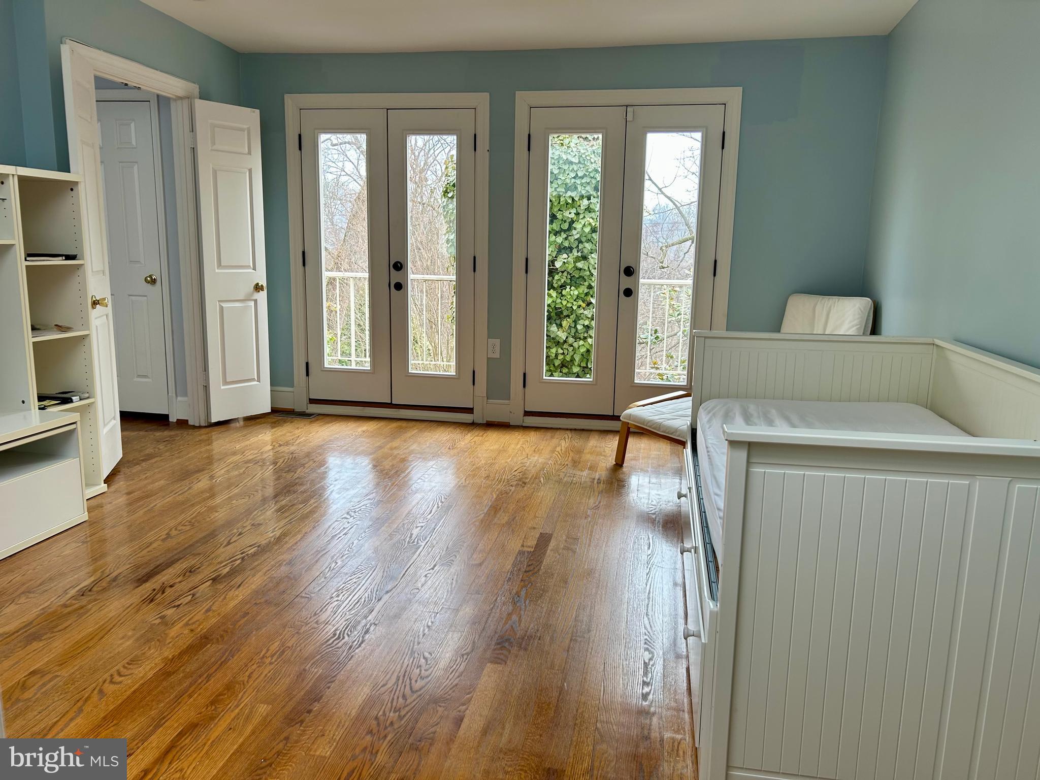 4416 Lingan Road Northwest Washington, DC 20007 - Photo 33 of 59 a view of a room with wooden floor and a window