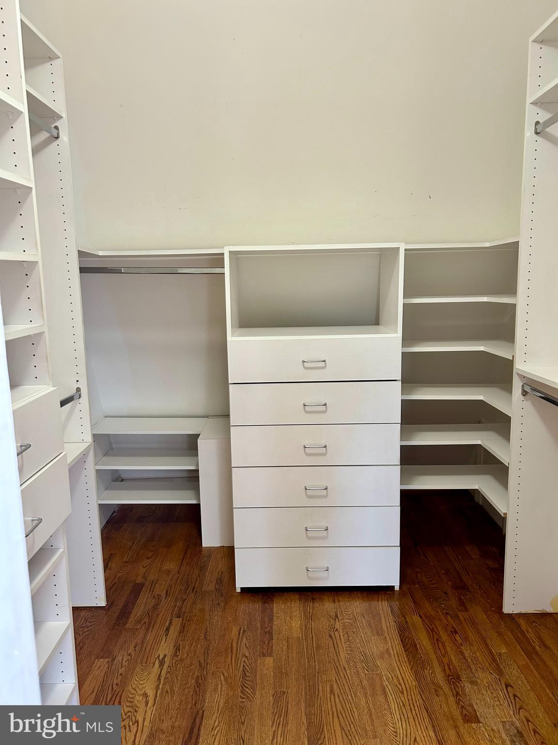 4416 Lingan Road Northwest Washington, DC 20007 - Photo 40 of 59 a view of walk in closet with empty racks