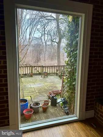 a view of a chairs and tables in the patio