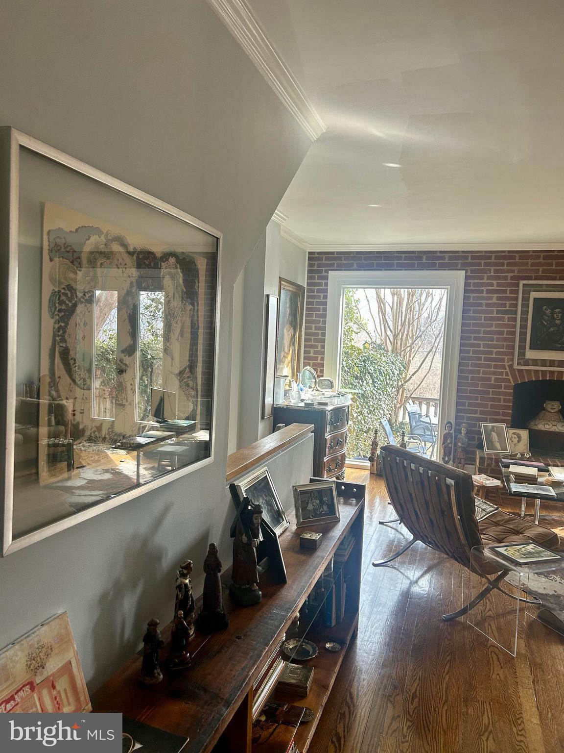 4416 Lingan Road Northwest Washington, DC 20007 - Photo 9 of 59 a room with furniture and large windows