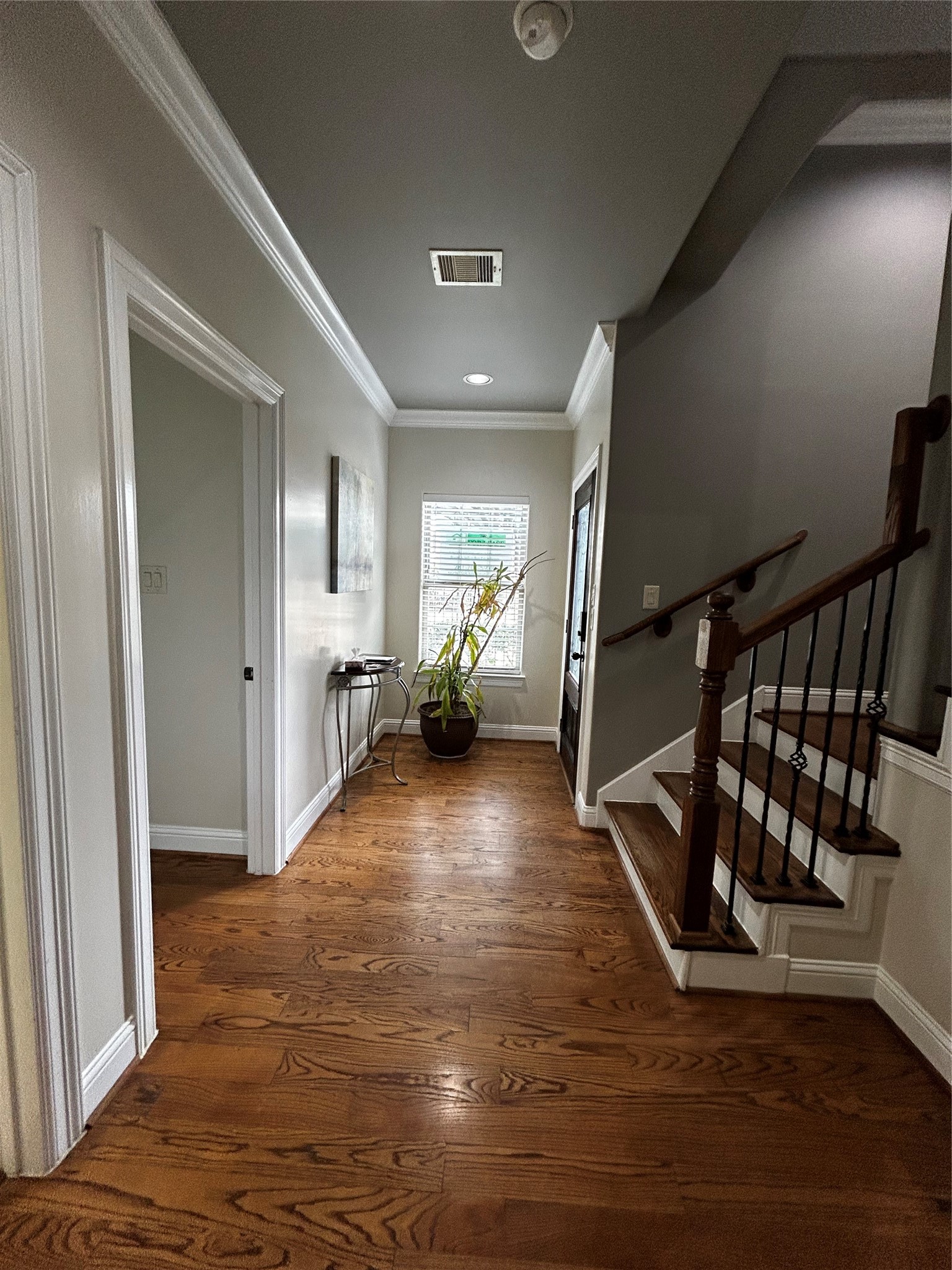 4406 Crawford Street Houston, TX 77004 - Photo 11 of 19 a view of an entryway with wooden floor