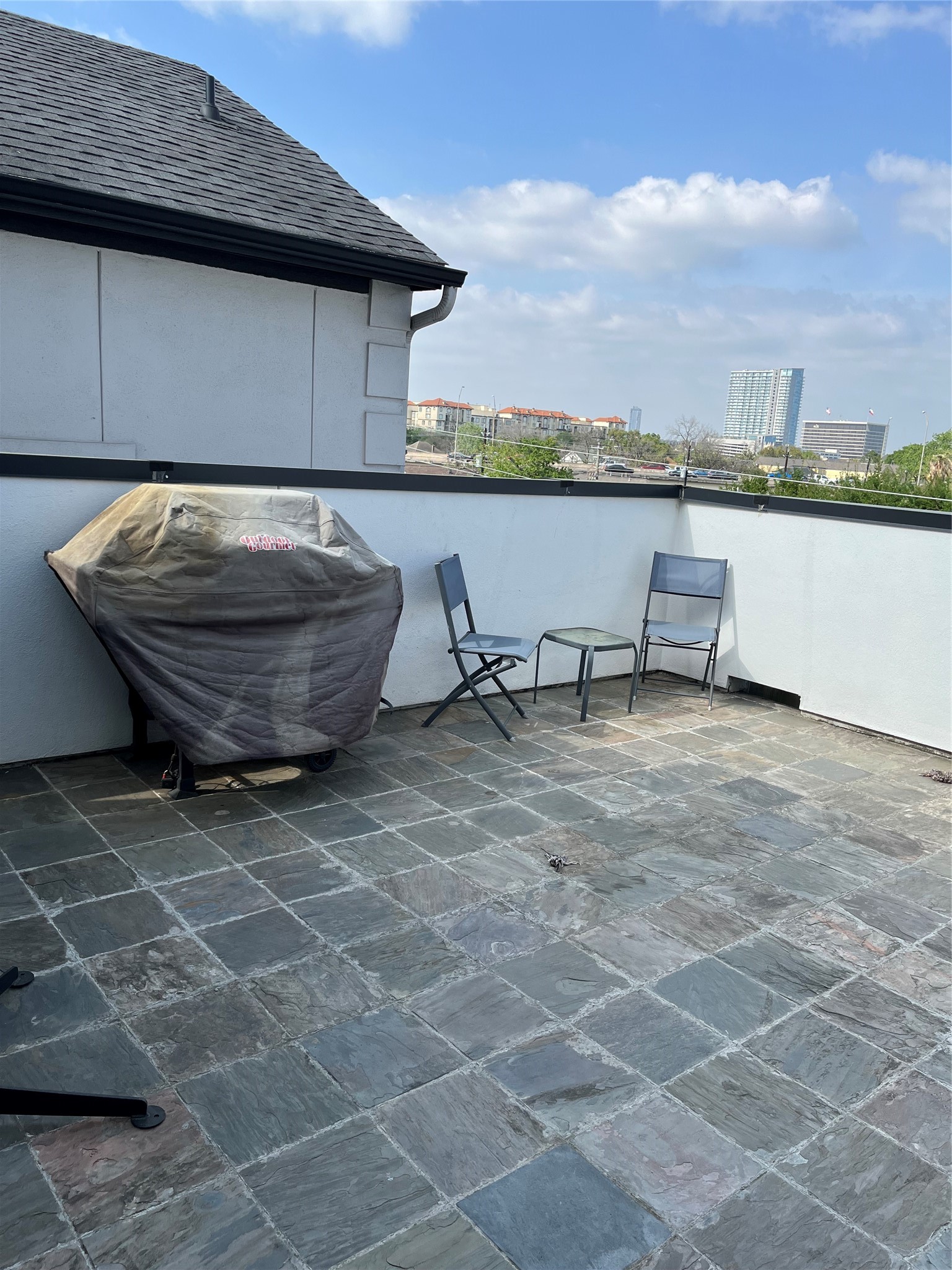 4406 Crawford Street Houston, TX 77004 - Photo 14 of 19 a backyard of a house with table and chairs