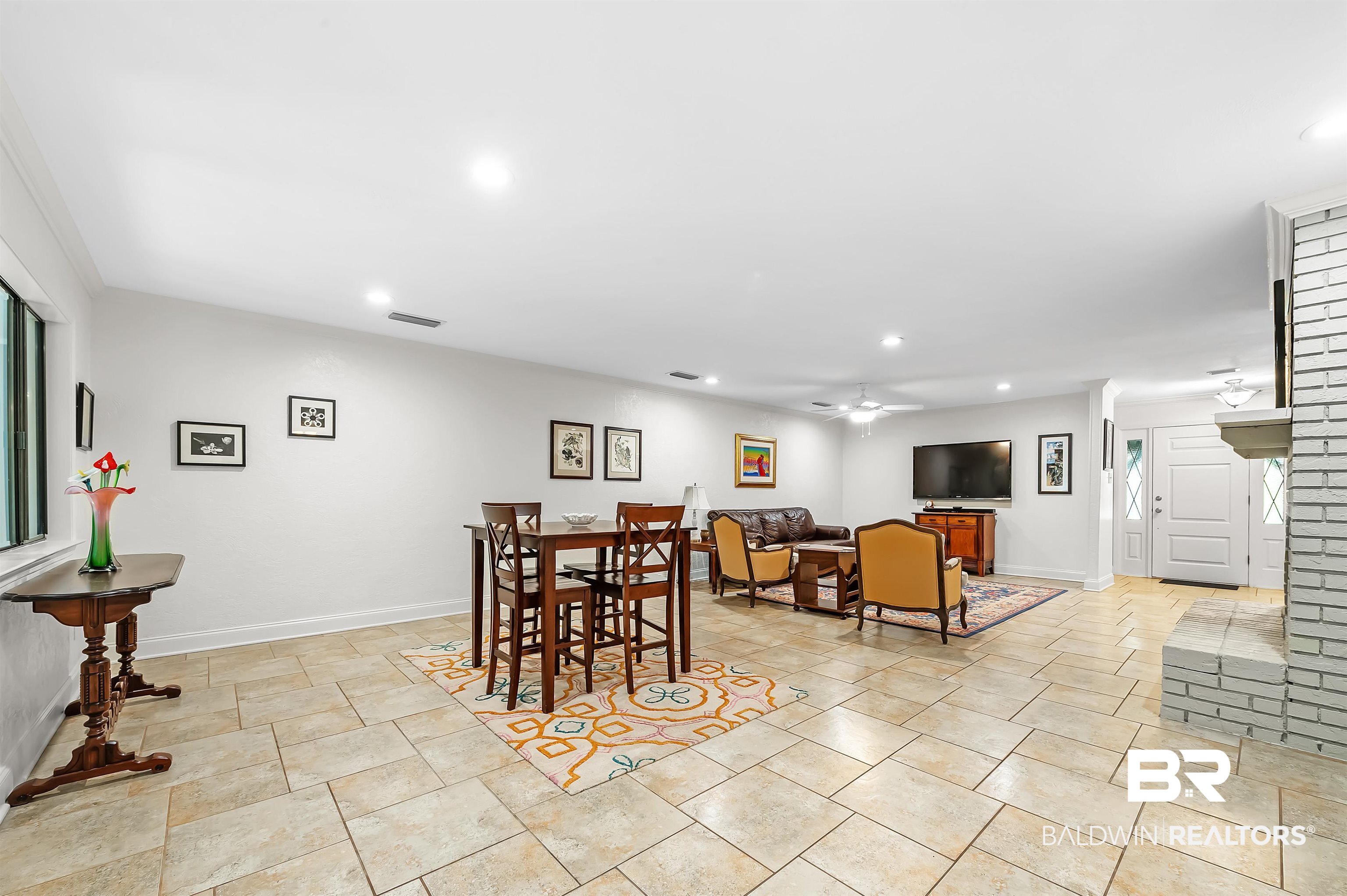 104 James Circle Daphne, AL 36526 - Photo 33 of 62 Tiled dining area with ceiling fan