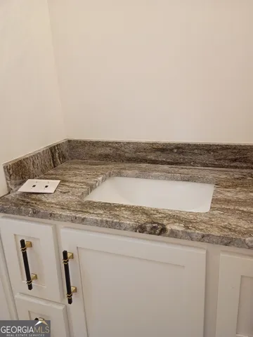 a utility room with washer and dryer