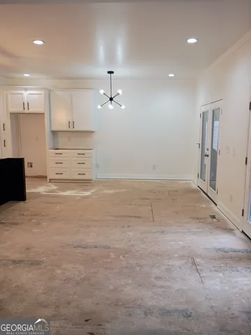 a view of a livingroom with a furniture