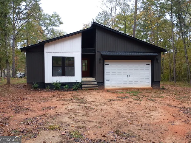 a view of house with stairs