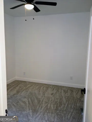 a close view of stove and microwave