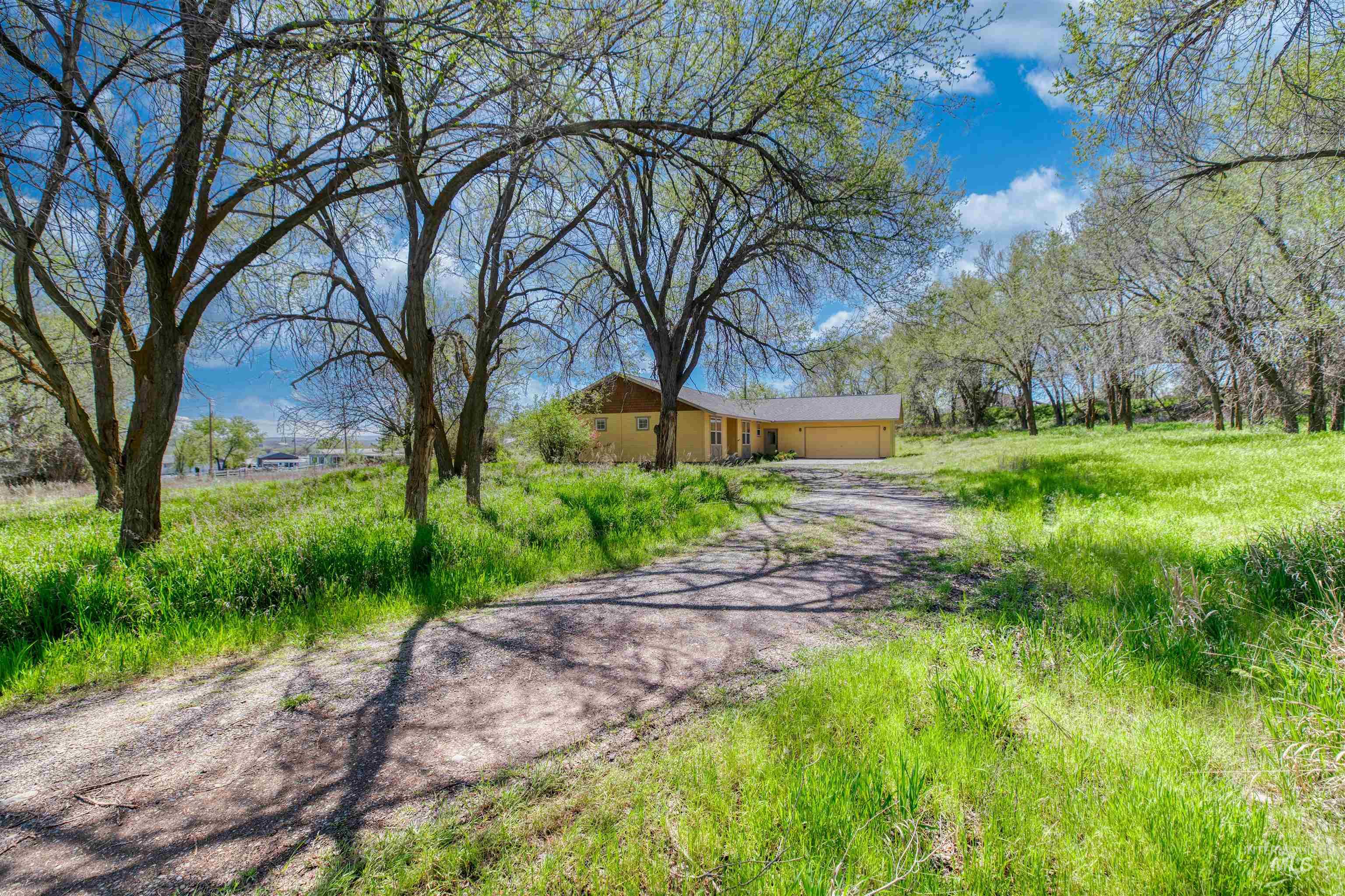 1295 15th Street Vale, OR 97918 - Photo 27 of 50 View of front of home with driveway and an attached garage
