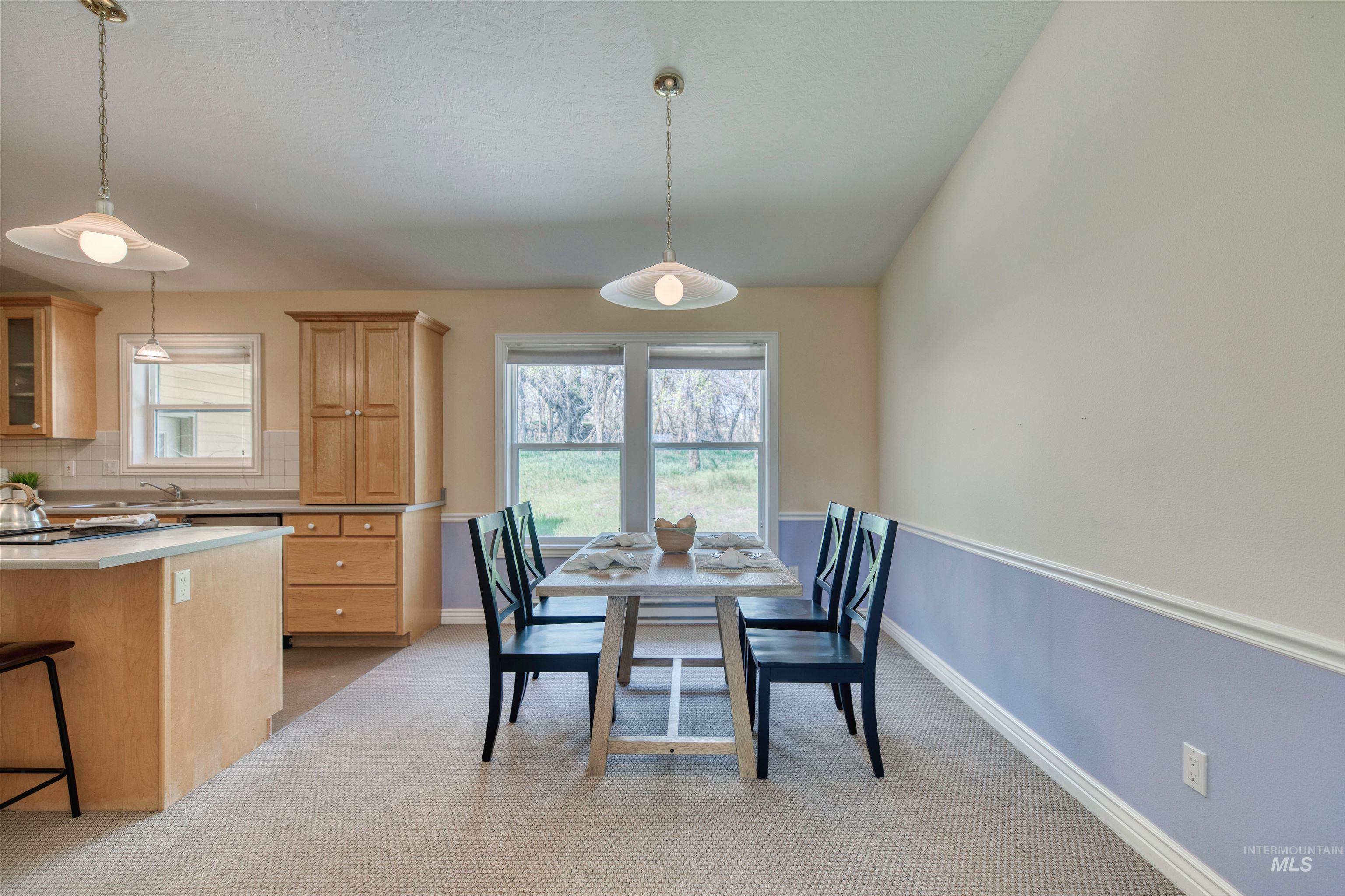 1295 15th Street Vale, OR 97918 - Photo 6 of 50 Dining space featuring light colored carpet and baseboards