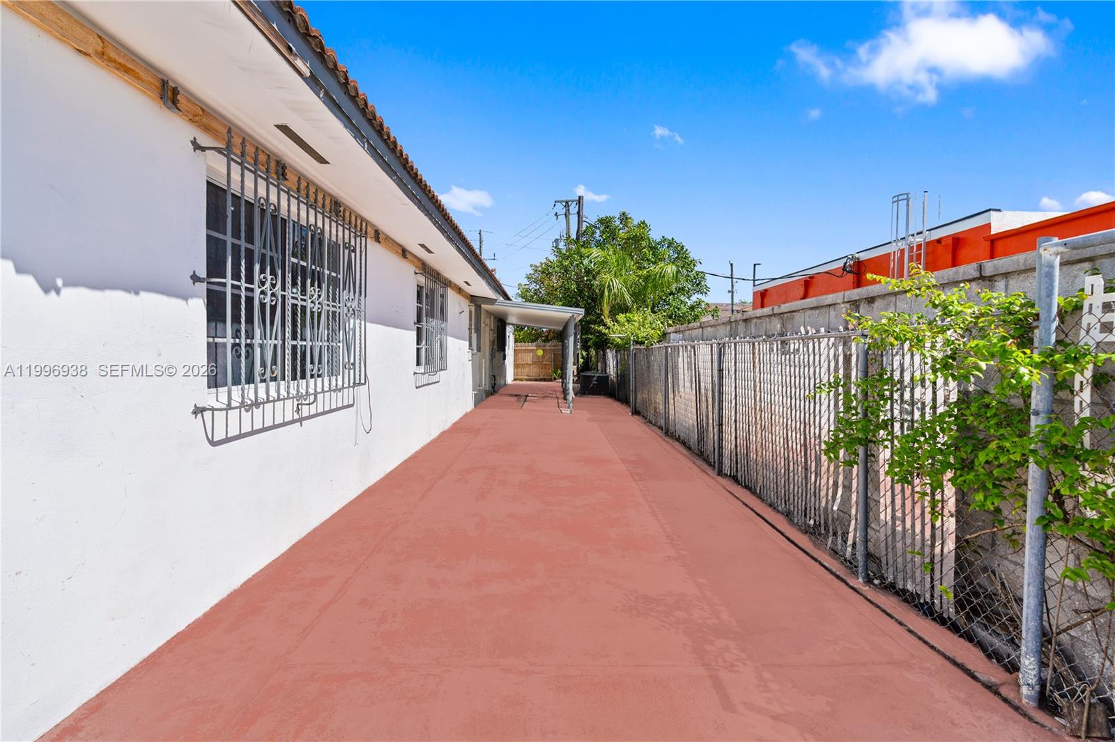 361 East 39th Street, Unit 1 Hialeah, FL 33013 - Photo 3 of 47 a balcony with an outdoor space