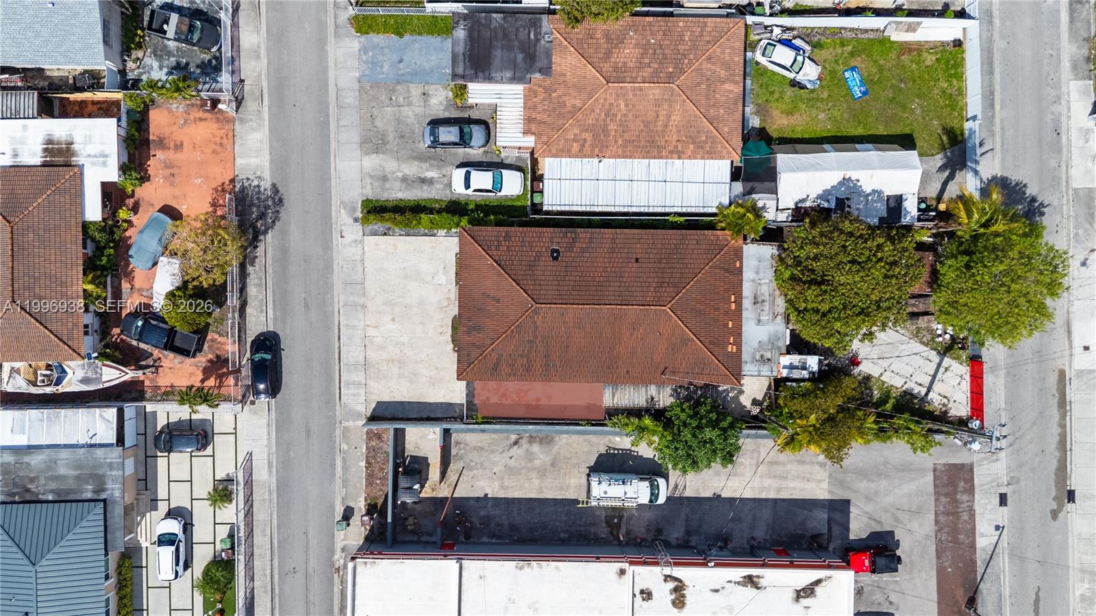 361 East 39th Street, Unit 1 Hialeah, FL 33013 - Photo 36 of 47 an aerial view of a house with a yard