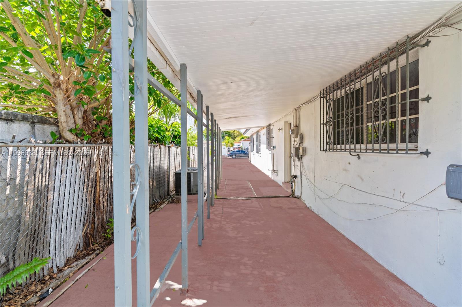 361 East 39th Street, Unit 1 Hialeah, FL 33013 - Photo 4 of 47 a view of porch with wooden floor and outdoor space