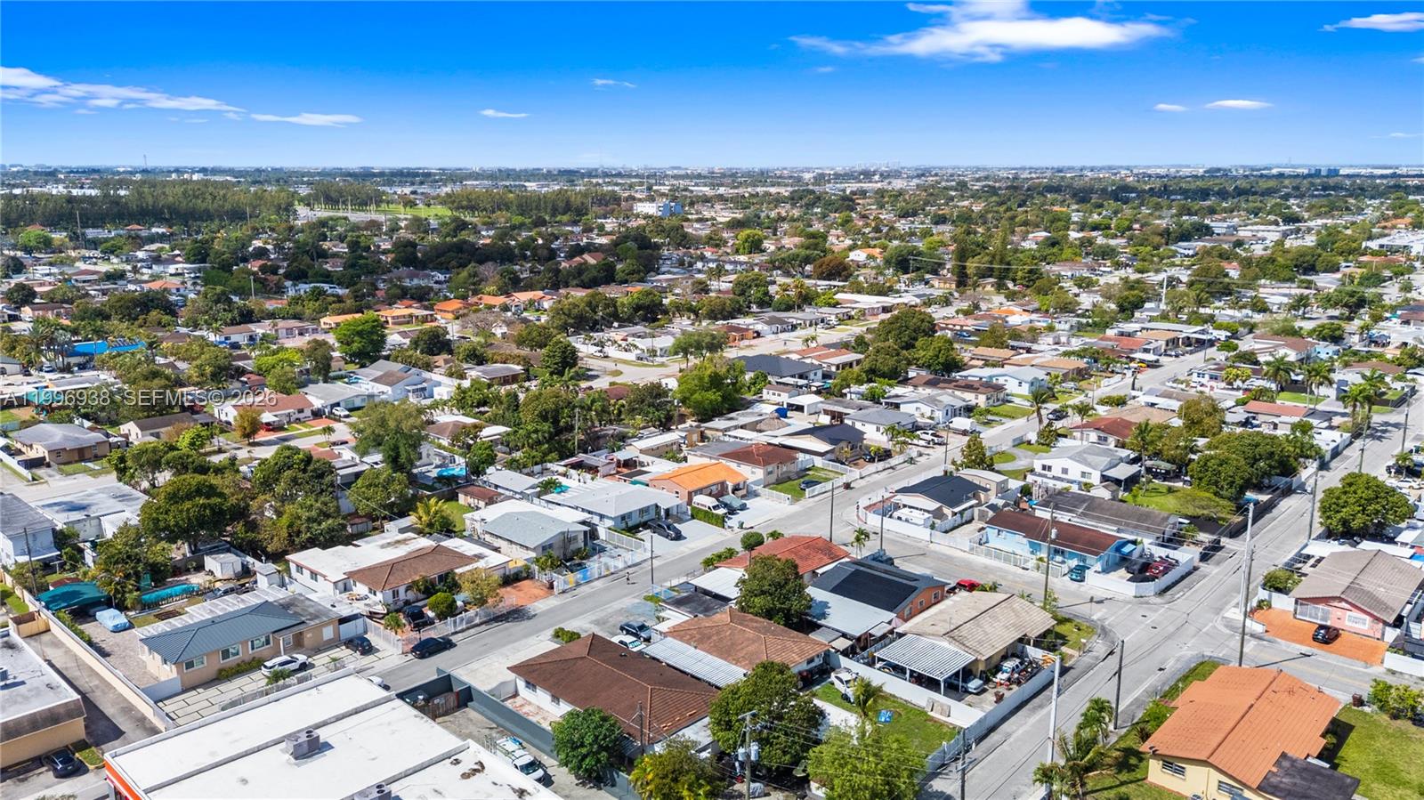361 East 39th Street, Unit 1 Hialeah, FL 33013 - Photo 41 of 47 an aerial view of a city with lots of residential buildings