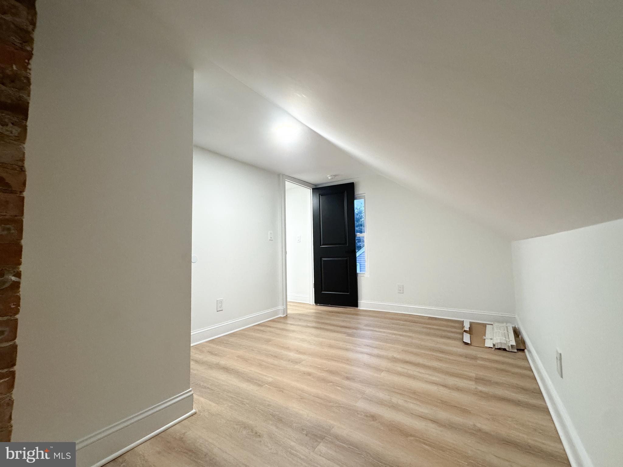 223 Main Street Hamilton, NJ 08620 - Photo 12 of 22 a view of an empty room with wooden floor