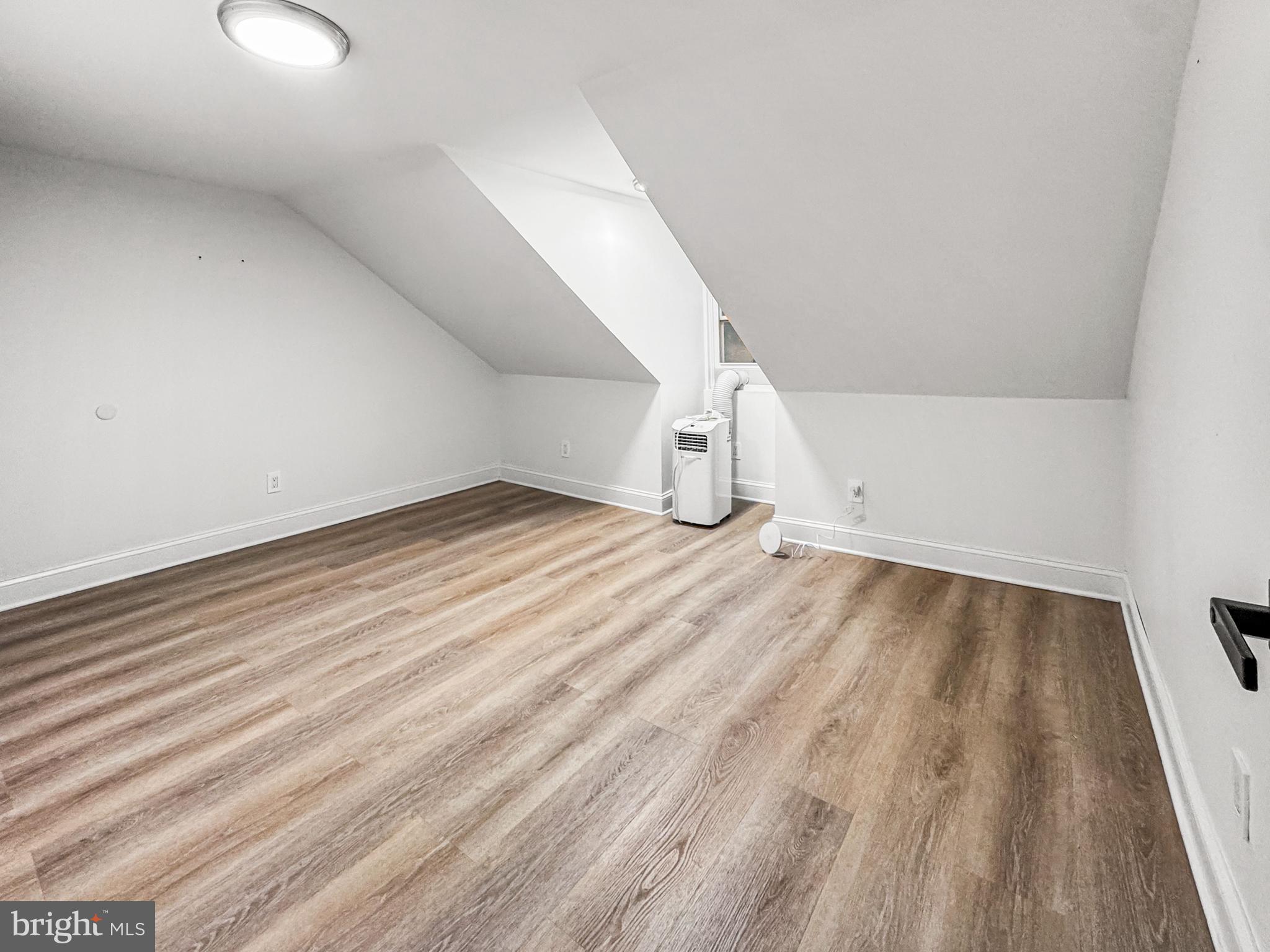 223 Main Street Hamilton, NJ 08620 - Photo 13 of 22 a view of a room with wooden floor and white walls