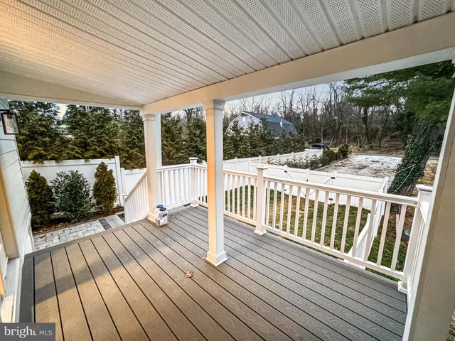 a view of outdoor space with wooden floor and outdoor space