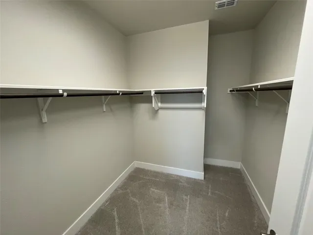 a small space with a sink and a toilet