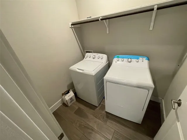 a utility room with dryer and washer