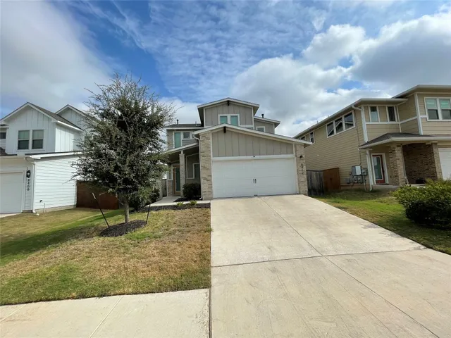 a house view with a garden space