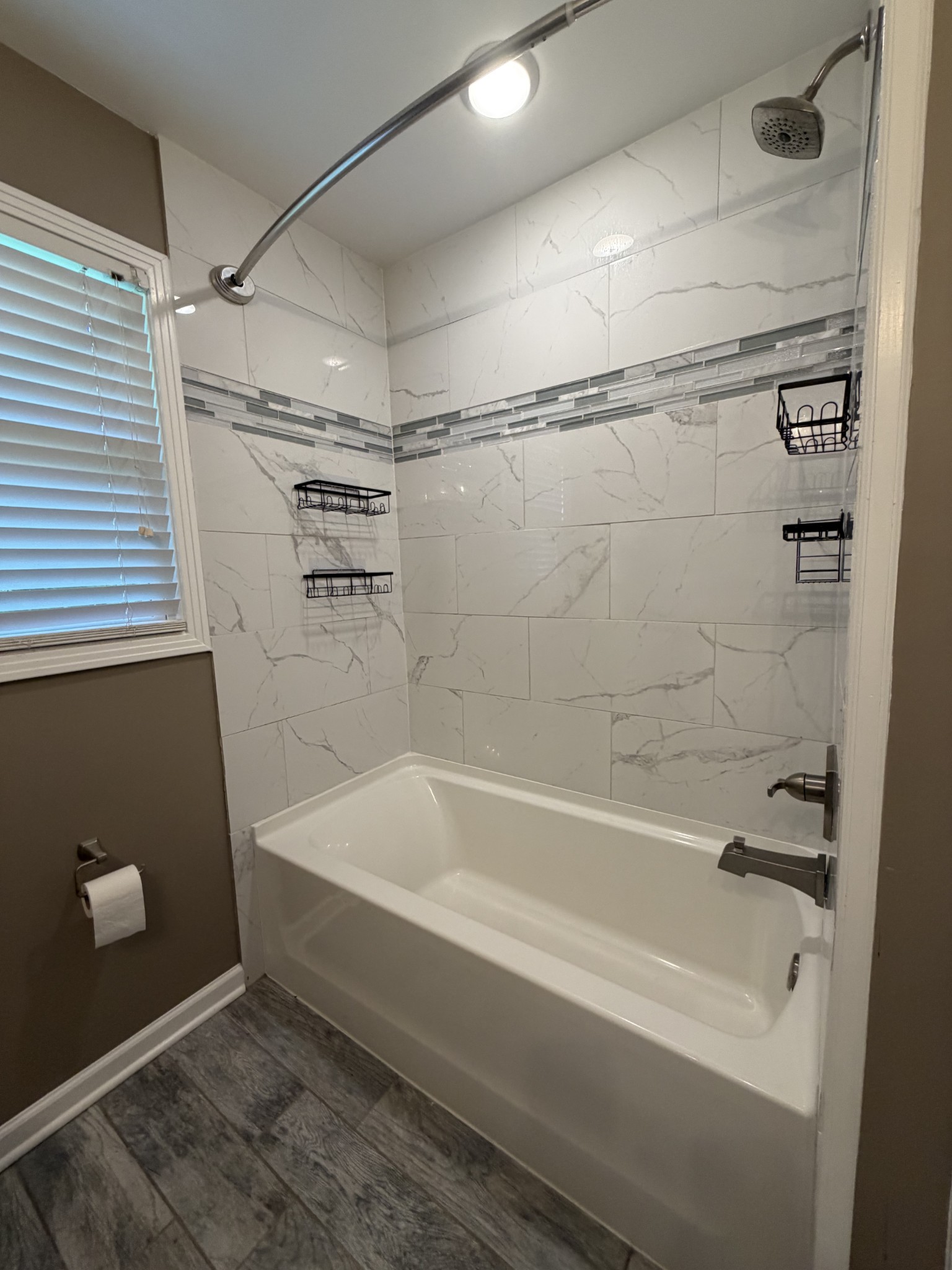 2280 Graham Cemetery Road Clarksville, TN 37043 - Photo 13 of 19 a bathroom with a bathtub and a shower