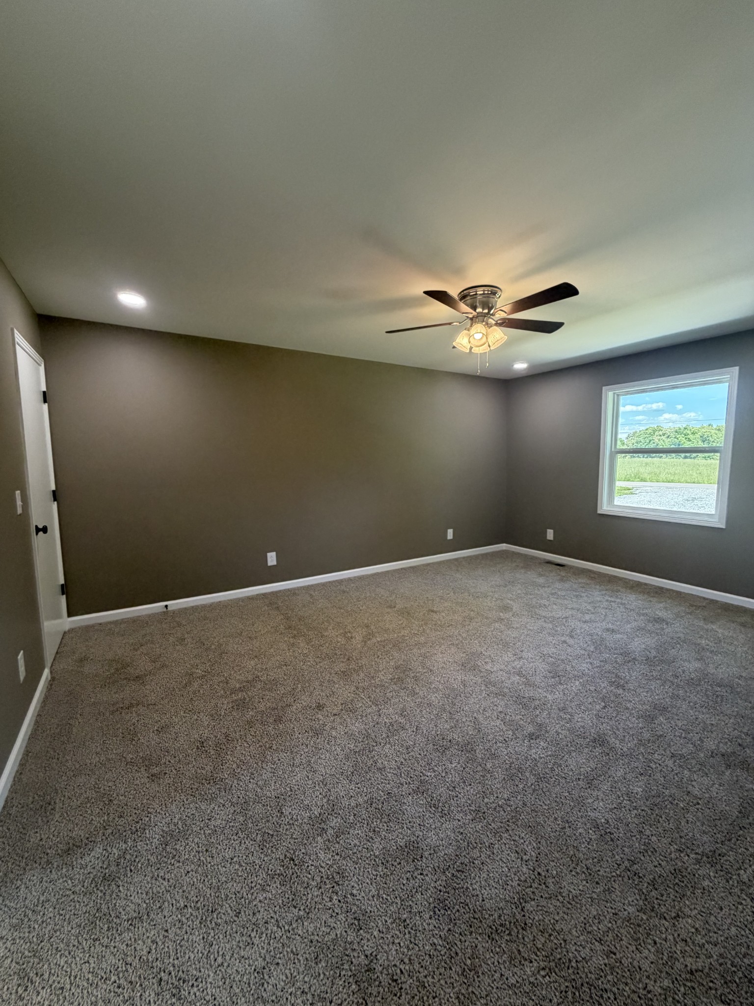2280 Graham Cemetery Road Clarksville, TN 37043 - Photo 14 of 19 a view of a livingroom with a ceiling fan and window