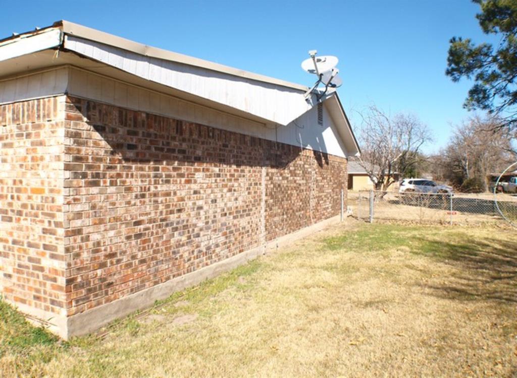 511 California Street Clyde, TX 79510 - Photo 9 of 13 a view of a building with a outdoor space