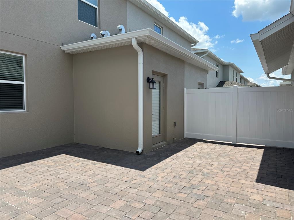 3128 Addison Boulevard St. Cloud, FL 34771 - Photo 25 of 35 a view of a house with a flat screen tv