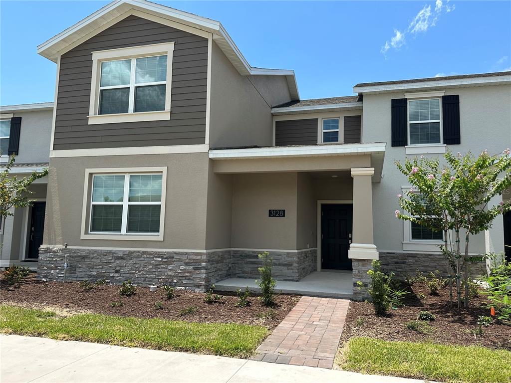 3128 Addison Boulevard St. Cloud, FL 34771 - Photo 27 of 35 a front view of a house