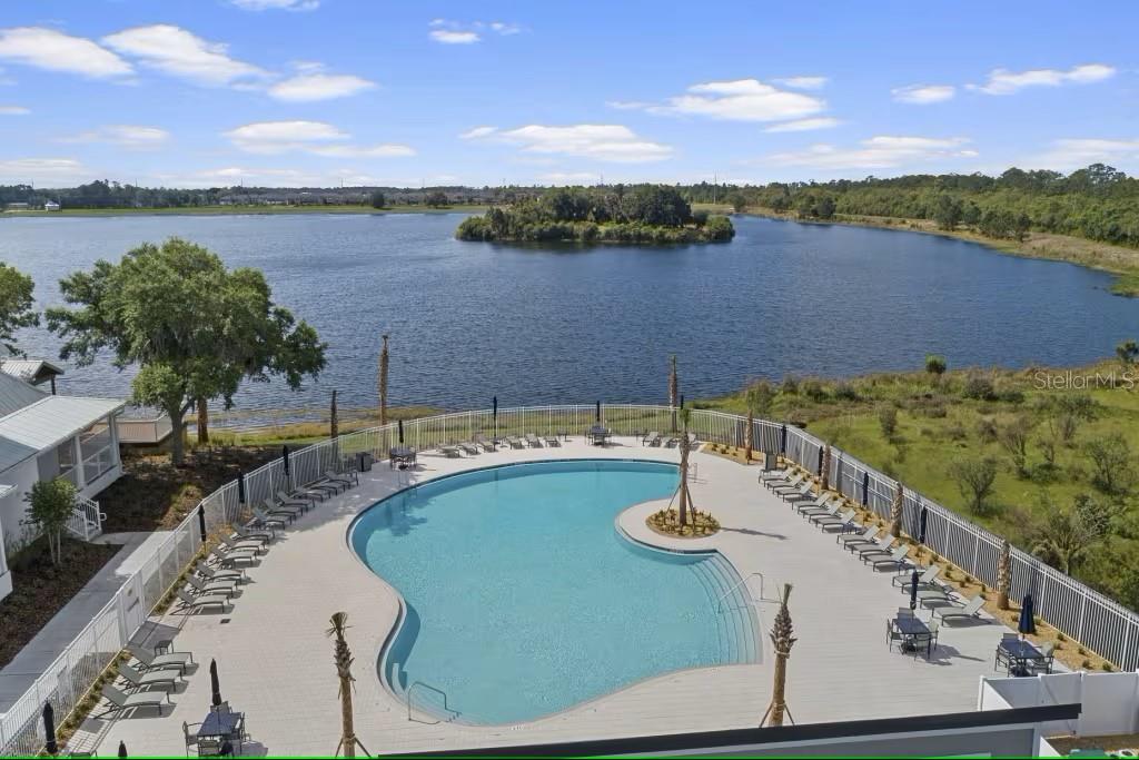 3128 Addison Boulevard St. Cloud, FL 34771 - Photo 33 of 35 a view of a swimming pool with a patio