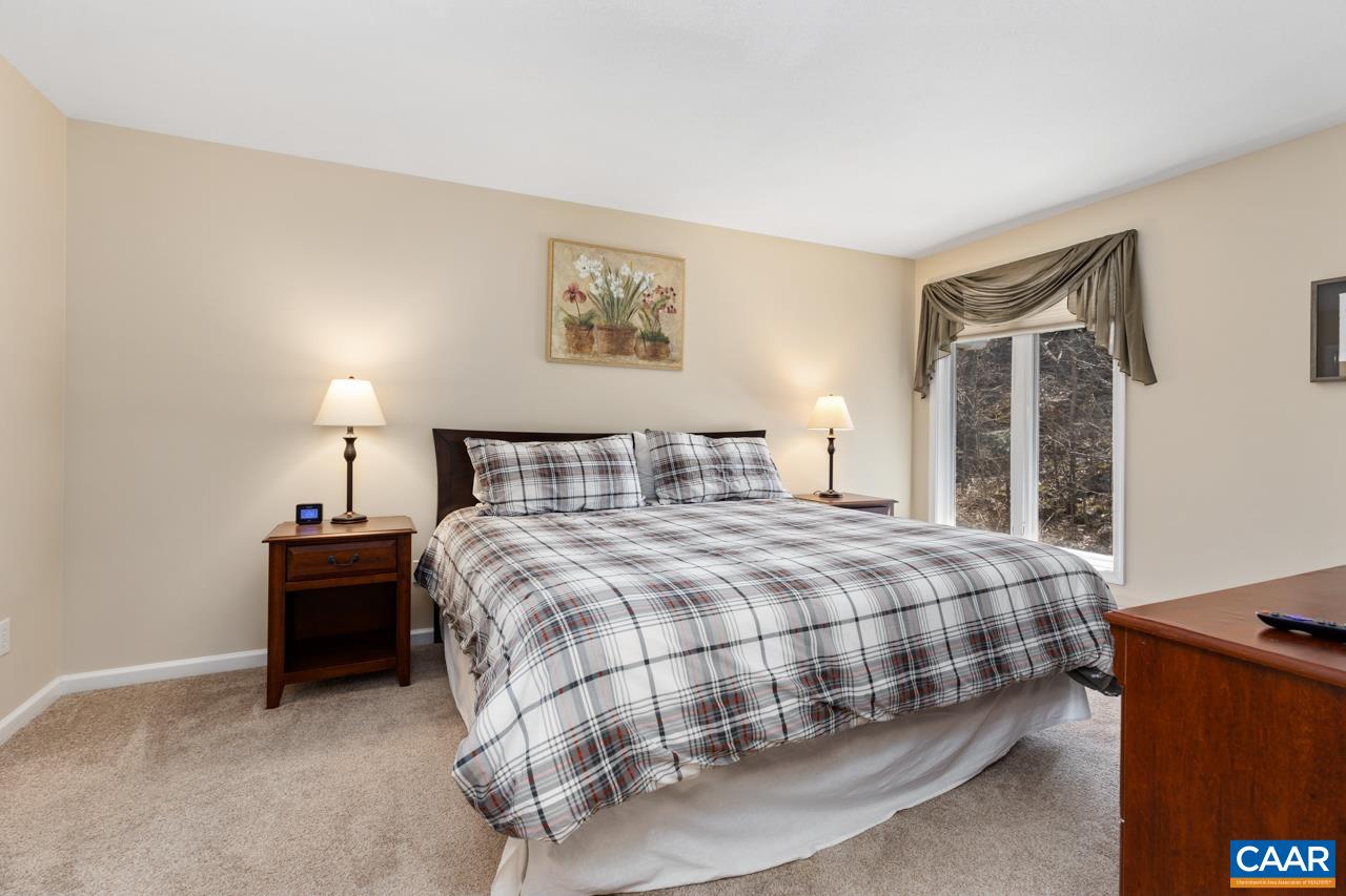 2078 Stone Ridge Roseland, VA 22967 - Photo 16 of 39 a bedroom with a bed and a night stand