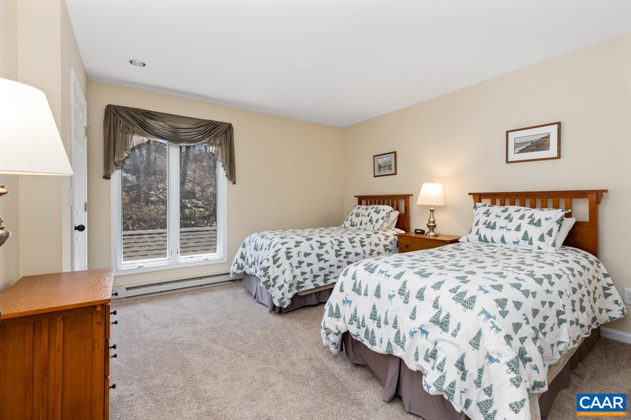 2078 Stone Ridge Roseland, VA 22967 - Photo 21 of 39 a bedroom with two beds and a window