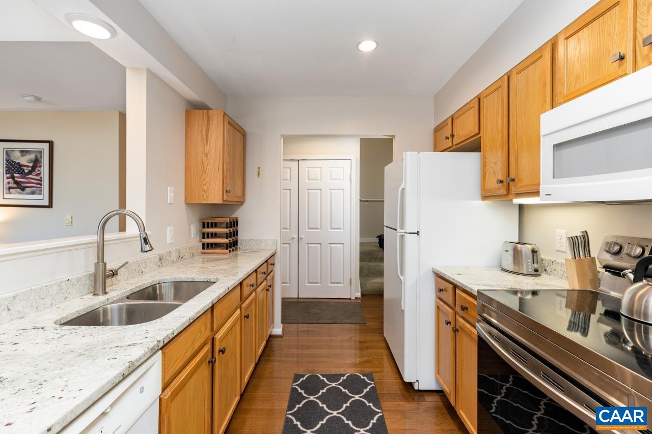2078 Stone Ridge Roseland, VA 22967 - Photo 4 of 39 a kitchen with a sink stove and refrigerator
